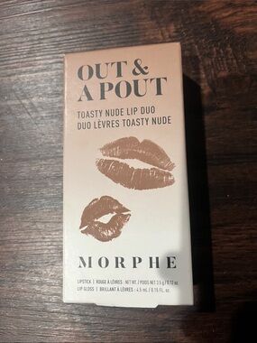 NIB OUT & A POUT IN THE COLOR TOASTY NUDE 👄